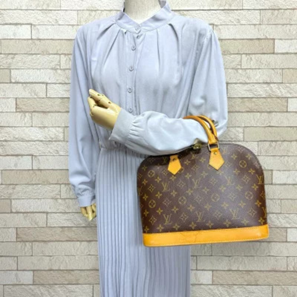 Louis Vuitton Canvas Monogram Handbag Brown Alma